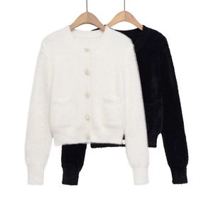 Women's knit cardigan with round neck, long sleeves and decorative buttons in black and white