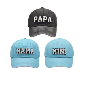 Close-up of PAPA MAMA MINI baseball caps with high-quality towel embroidery detail