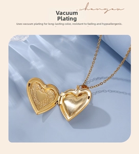 Detailed macro view of an openable heart locket necklace in polished 18K gold finish