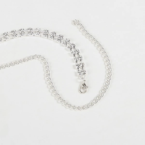 Detail of silver rhinestone fringe headpiece with adjustable lobster clasp extension