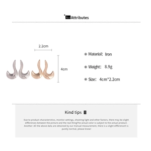 Detailed spec view of geometric iron earrings showing 4cm height and material specs