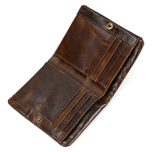 Detailed view of dark brown genuine leather bifold wallet showing multiple card slots