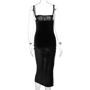 Detail of a slim fit black slip dress featuring a back slit on a transparent mannequin