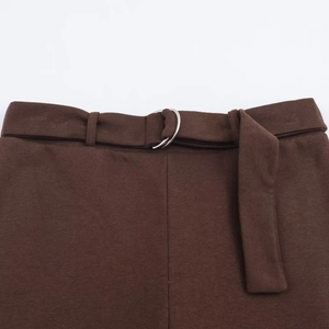 Brown velvet fashion trousers with a fabric belt and silver D-ring buckle detail