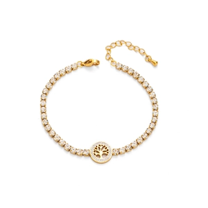 Detail of golden stainless steel bracelet featuring crystal pavé tree of life charm