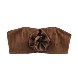 Dark brown tube top with 3D floral accent and textured pleated fabric design
