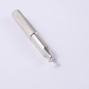 Macro detail of silver metal dermal anchor tool with non-slip knurled grip handle