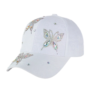 Fashionable white cotton baseball cap with shimmering rhinestone butterfly decorations