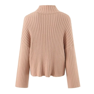 Detailed back view of apricot ribbed knit turtleneck sweater with drop shoulder design