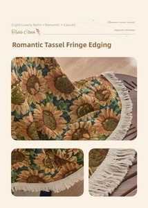 Detail of sunflower jacquard tablecloth featuring vintage cream tassel fringe edging