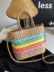 Rainbow striped woven straw tote bag with shoulder strap for beach and vacation style