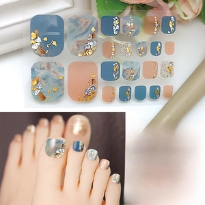 Detail of QYJ21-011 toe nail stickers with marble texture and glitter gold foil
