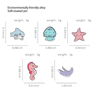 Cute ocean animal enamel pins made of alloy featuring shark jellyfish and seahorse designs