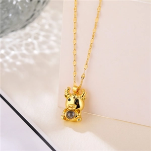 Golden zodiac ox projection necklace with cute cartoon pendant and link chain for women