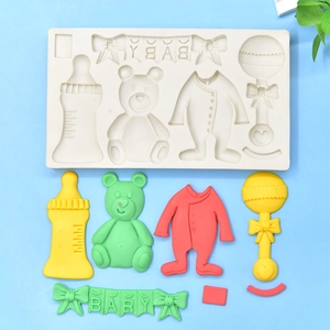 Silicone baby shower molds featuring milk bottle bear rattle and baby banner shapes
