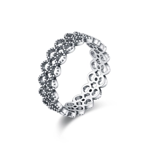 Lace pattern S925 sterling silver ring with hollow beaded design on white background