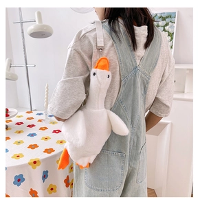Detailed back view of a white plush goose bag featuring a long neck and soft fuzzy texture