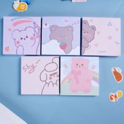 Close-up of cute cartoon teddy bear sticky notes set in soft purple and pink tones