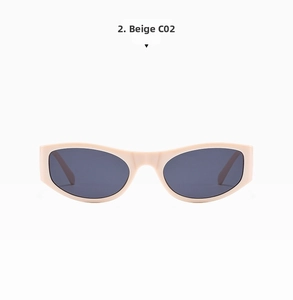 Close-up of beige oval sunglasses frames in C02 color with dark grey lenses