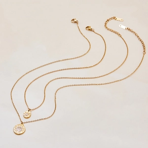 Double-layered gold stainless steel necklace featuring sparkling star pendant and rhinestones