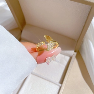 Adjustable gold fishtail ring with hollow design and sparkling zircon stones for women