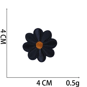 Detailed close-up of blue daisy embroidery patch showing size 4cm x 4cm and needlework