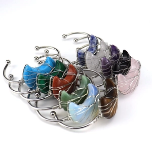 Detailed wire-wrapped silver crescent moon bracelets with multiple natural gemstone colors