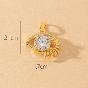 Detailed view of evil eye charm with dimensions 2.1cm by 1.7cm in gold finish