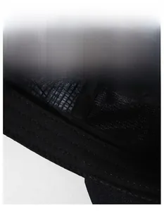 Detail of black sports cap featuring a widened sweatband and breathable mesh lining