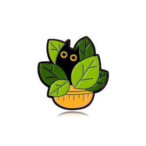 Cartoon black cat hiding in green leaves and orange flower pot enamel metal pin badge