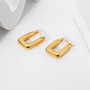 Square hoop earrings in 18K gold plated stainless steel shown on a minimalist white backdrop