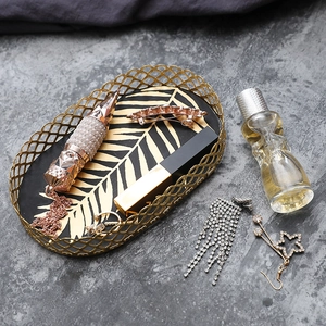 Nordic gold iron jewelry tray with black palm leaf pattern for desktop organizing