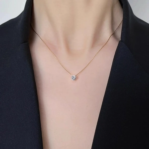 Elegant minimalist gold thin chain necklace featuring a brilliant round-cut zircon pendant