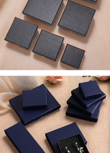 Linen texture jewelry gift boxes in navy blue and grey with elegant rose accents
