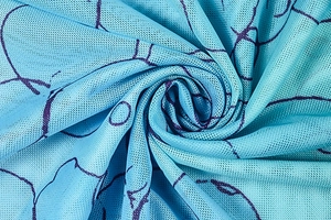 Detailed close-up of light blue mesh fabric with purple abstract lines and breathable texture