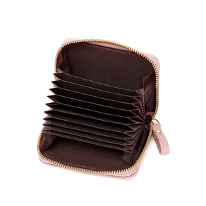 Pink RFID blocking zipper accordion card holder with multiple slots in a sleek design