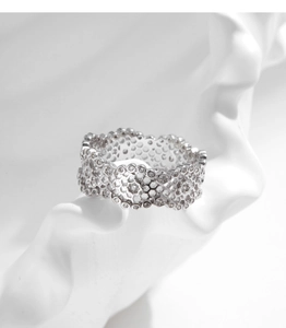 Detailed view of s925 silver hollow lace ring with honeycomb pattern and sparkling zircons