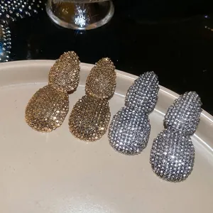 Vintage double oval drop earrings in gold and silver finish with sparkling micro-pave crystals
