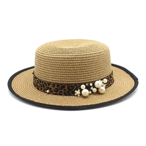 Flat top straw boater hat with leopard print ribbon and pearl accents for summer beach
