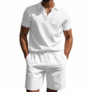 Detailed texture of white linen polo shirt and drawstring shorts set on male model