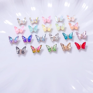 3D crystal butterfly nail charms in 20 vibrant colors with sparkling faceted surfaces