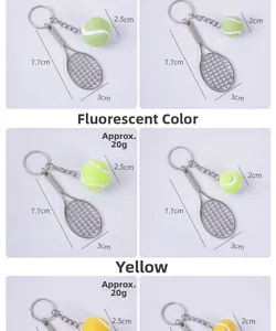 Detailed view of mini tennis racket keychain with size specs of 7.7x3cm and fuzzy ball