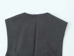 Detail view of the deep gray dress back featuring a seamless invisible zipper closure