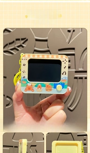 Close-up of eco-friendly cartoon Capybara yellow gadget case with cute burger prints