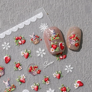 3D embossed nail art stickers featuring strawberry, rabbit, and snowflake patterns