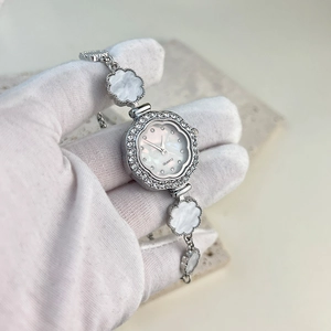 Elegant floral quartz watch with silver rhinestone plum dial and clover shell bracelet