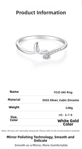 Detail view of S925 silver ring with cubic zirconia crescent moon and white gold finish