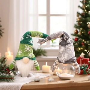 Christmas gnome forest figures with green and gray knit hats on clear festive bases