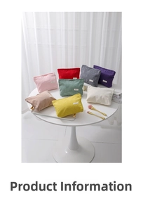 Detail view of colorful corduroy makeup bags in various soft pastel colors on a table