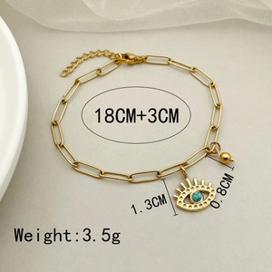 Detail of evil eye paperclip chain bracelet in gold finish with turquoise stone and dimensions